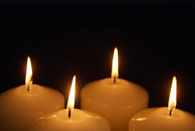 four lit candles