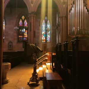 photo: light streaming from clerestory windows onto lectern