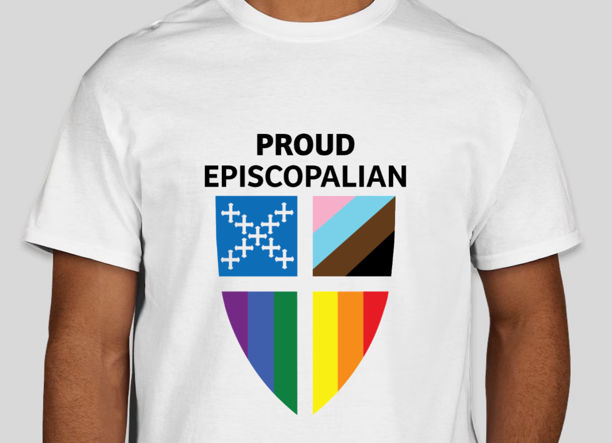 photo of t-shirt that says "proud Episcopalian" and features the Episcopal Church shield in the colors of the LGBTQ+ flag